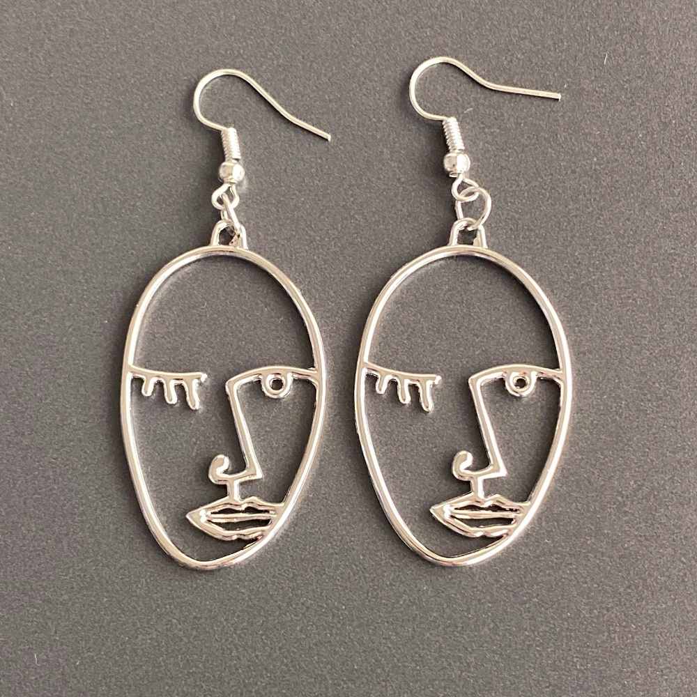 NEW Human Face Earrings in Silver color